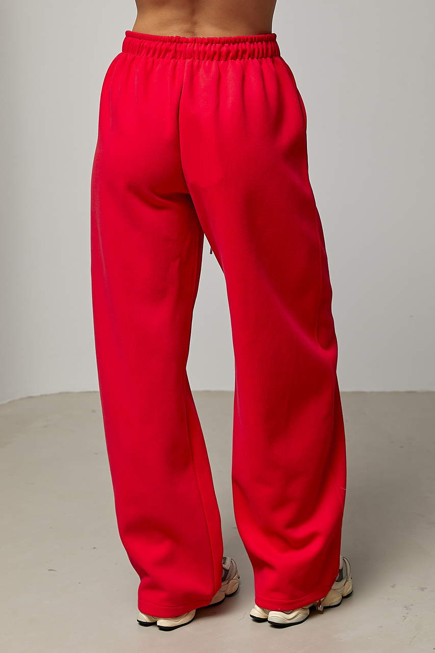 Однотонні спортивні штани із затяжками - червоний колір, ONE SIZE 1