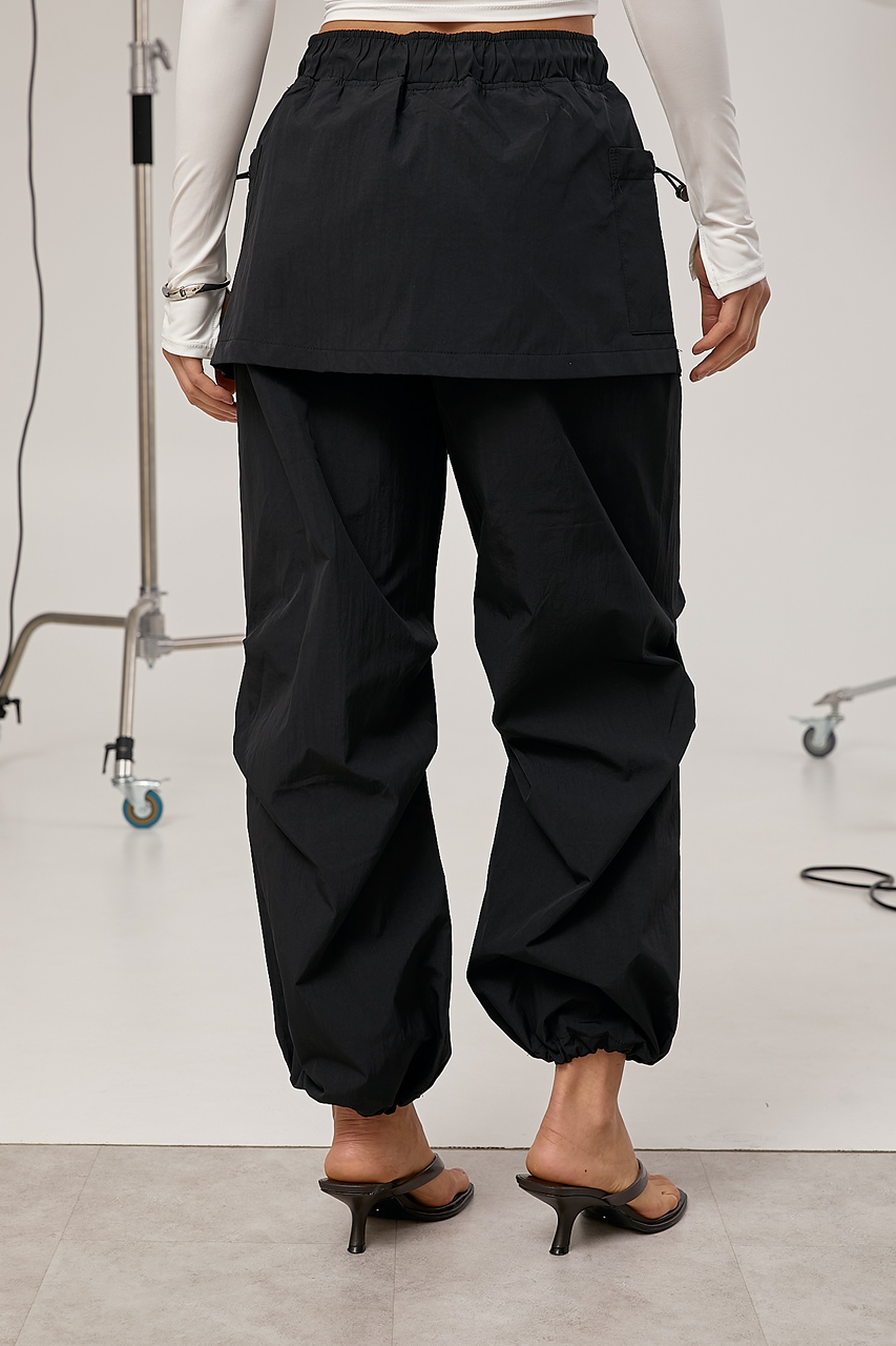 Жіночі штани з плащівки зі спідницею - чорний колір, ONE SIZE 1